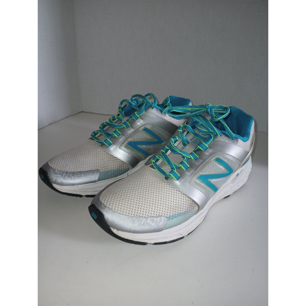New Balance 3040 Aqua/Silver Sneaker size 9B Women's.  24